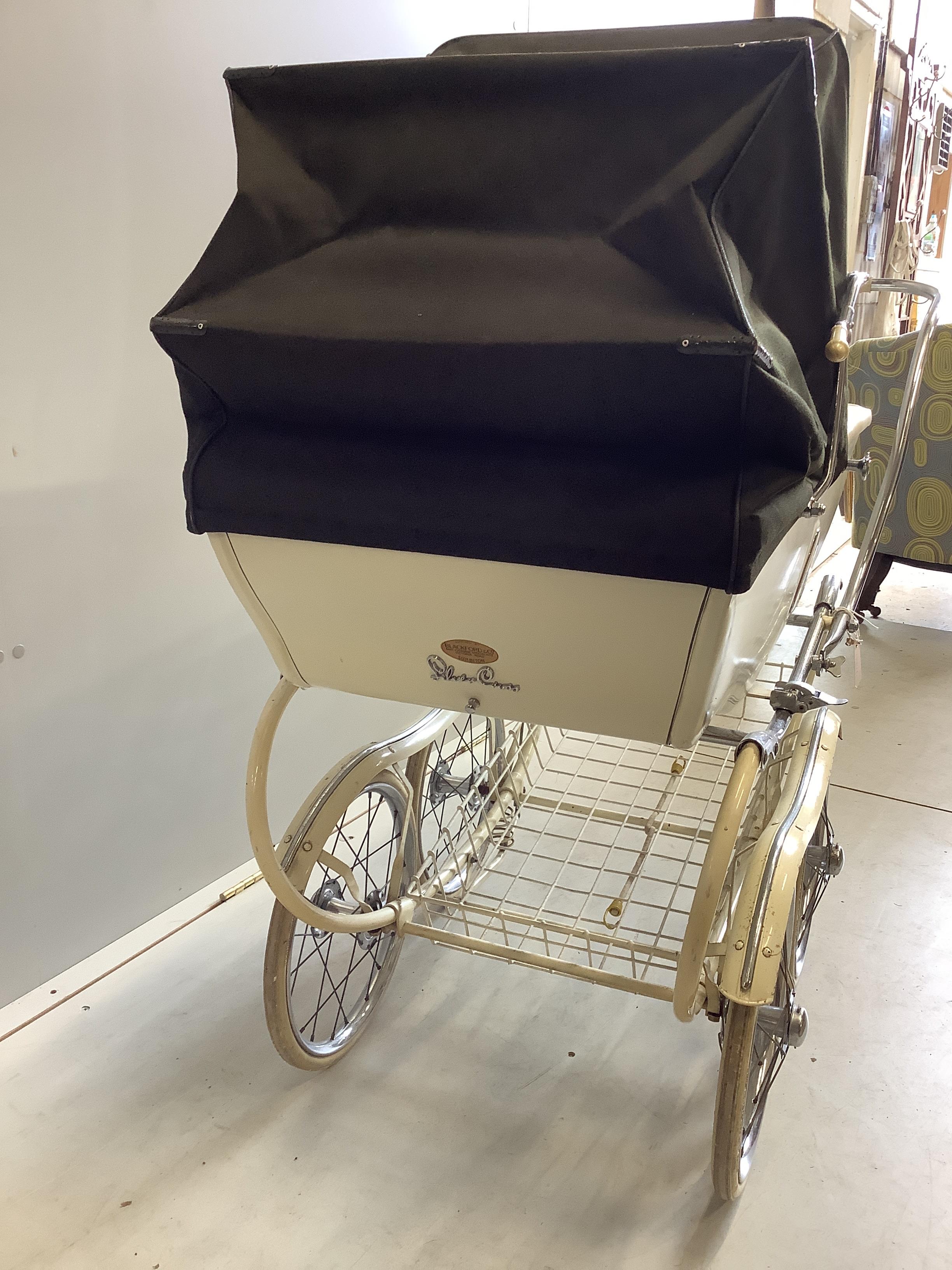 A vintage Silver Cross pram, height 112cm